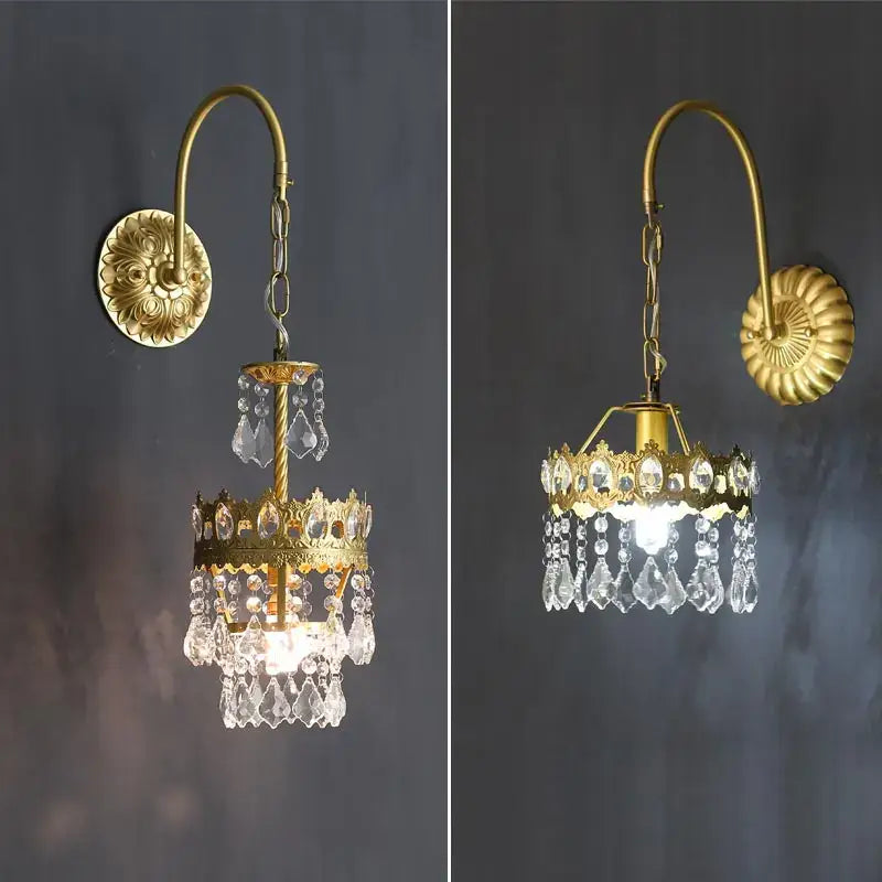 Antique brass wall sconce with cascading clear crystal droplets and ornate crown design for decorbites copper crystal lighting