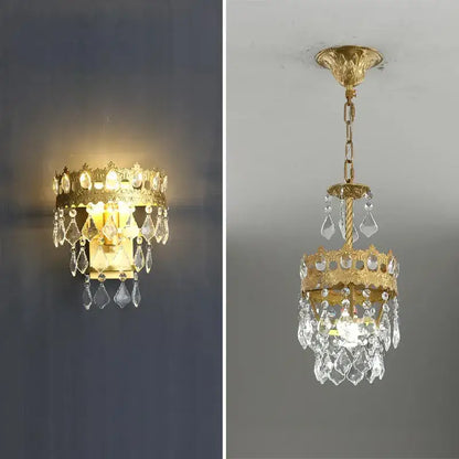 Gold-toned decorbites copper crystal chandelier with clear crystal droplets and ornate detailing for modern living room lighting