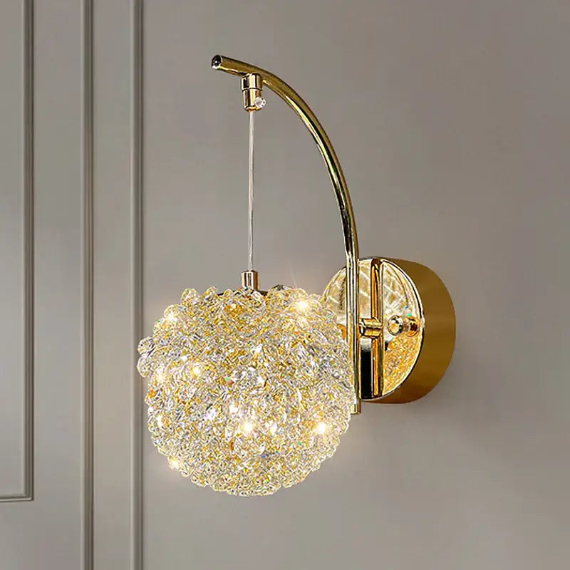 Modern copper crystal wall sconce with gold-toned brass arm and spherical crystal globe for living room decorbites crystal wall lighting