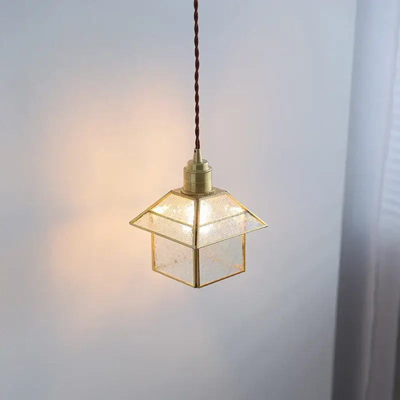 Modern copper cube glass led pendant light with warm-toned brass geometric lantern design and textured glass panels