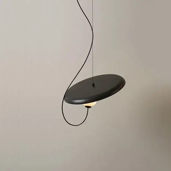 Black matte pendant light with sleek curved cord in modern copper decorbites grid color led design for dining room
