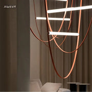 Modern copper decorbites leather belt chandelier with sleek curved leather-wrapped design for dining room lighting