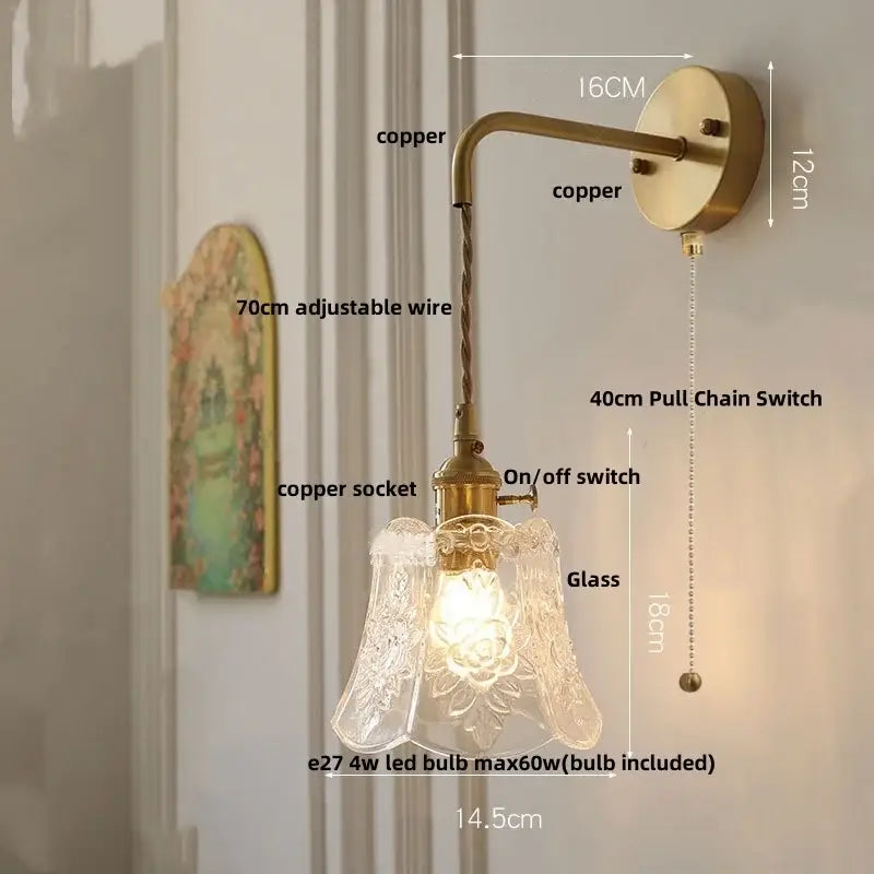 Antique brass-finished wall lamp with clear etched glass floral shade and adjustable copper arm led wall light fixture