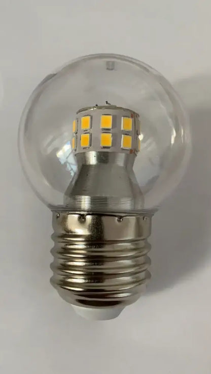 Modern copper glass balls pendant light featuring a clear glass globe led bulb with metallic screw base decorbites glass balls