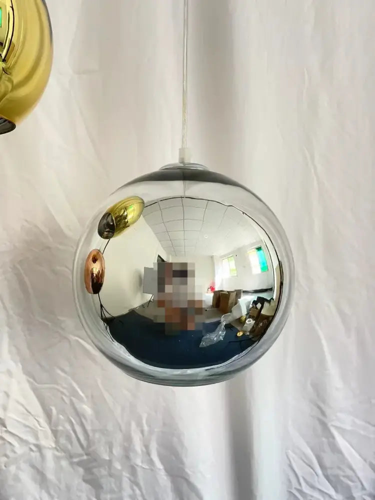 Modern copper glass balls pendant light featuring a sleek transparent globe with metallic accents for kitchen decorbites lighting