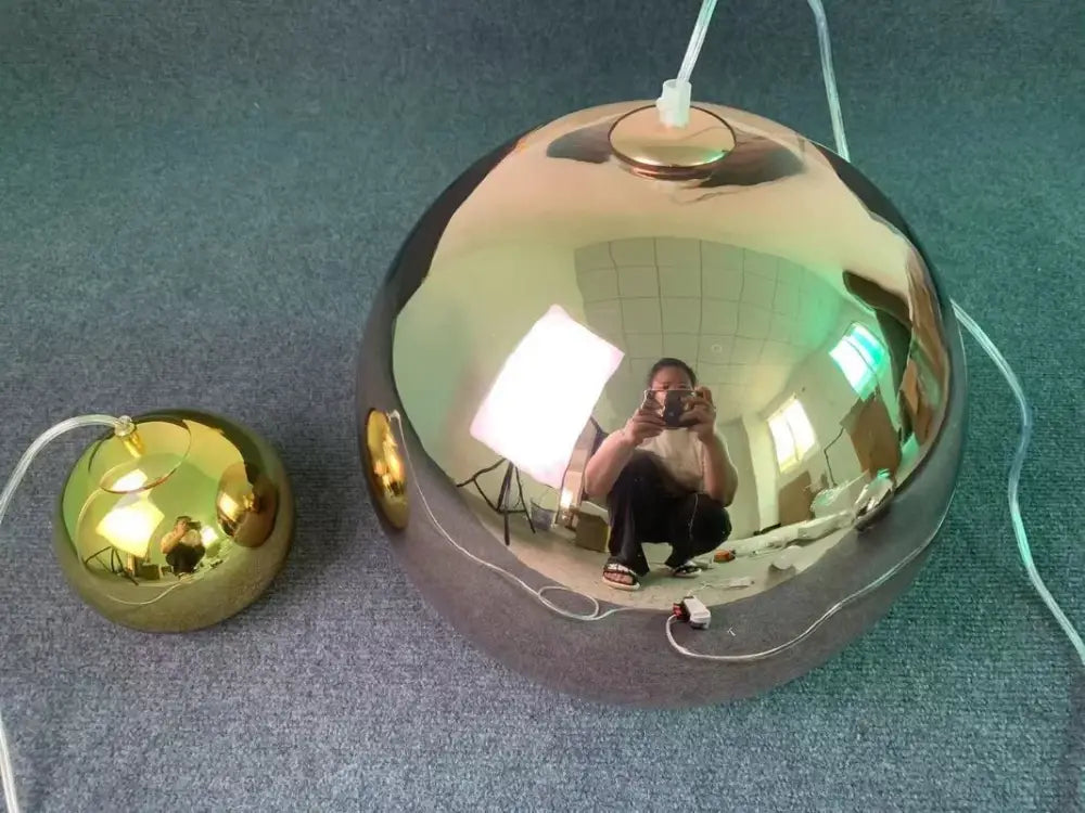 Shiny gold glass balls pendant light with reflective surface and white cord for modern kitchen decorbites lighting