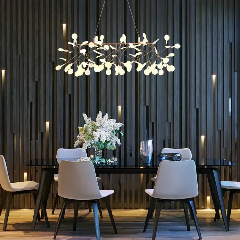 Modern copper heracleum chandelier with delicate branch design and frosted glass orbs by decorbites for dining room lighting