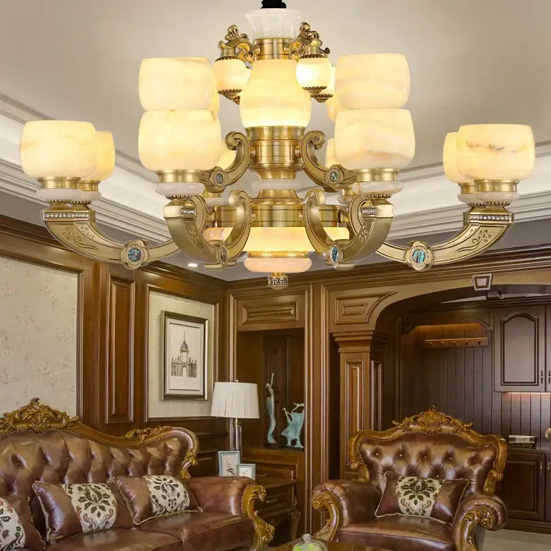 Modern copper jade chandelier featuring gold-toned frame, warm alabaster shades, and ornate detailing for living room lighting