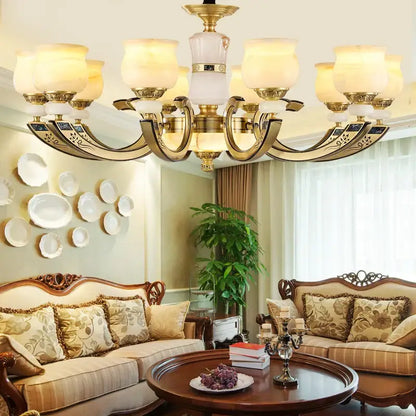 Modern copper jade pendant lamp with gold-toned ornate metal arms and frosted glass shades for dining room decorbites decor
