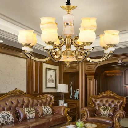 Gold-toned copper jade pendant lamp with ornate metal arms and warm frosted glass shades for dining room decorbites decor