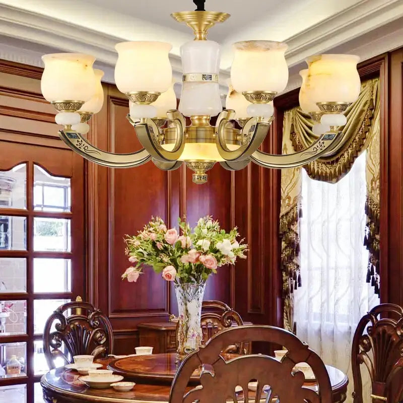 Modern copper jade pendant lamp with a gold-toned chandelier design and six frosted glass shades for dining room decorbites copper jade pendant