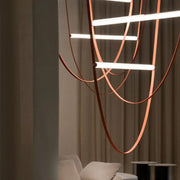 Modern copper leather bell pendant light with sleek curved design wrapped in leather for office decorbites pendant light