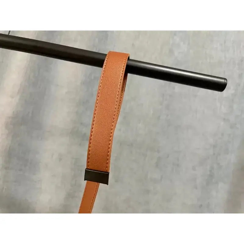 Modern copper led belt chandelier pendant light with a tan leather strap and sleek black metal clasp for decorbites led belt decor
