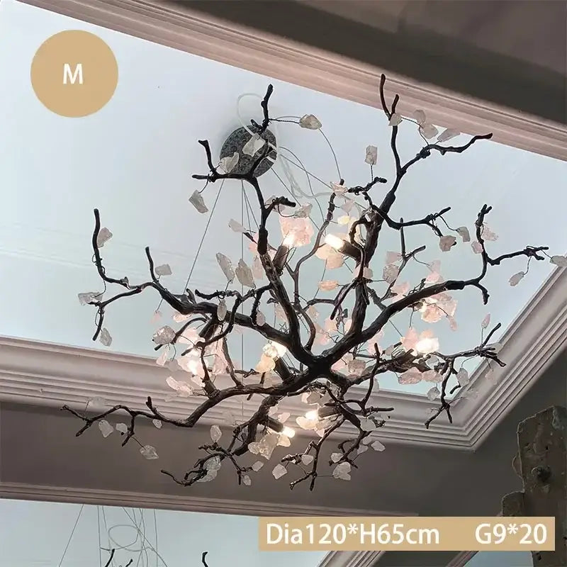 Modern copper led branch chandelier with dark bark finish and translucent pink quartz leaves for dining room decorbites copper led