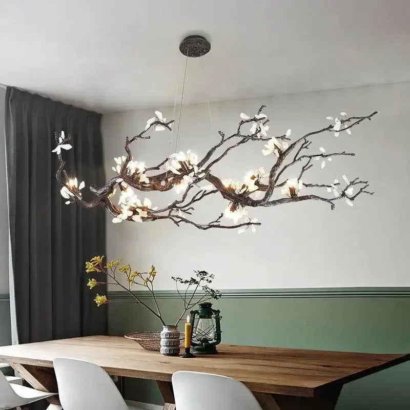 Modern decorbites copper led branch chandelier in black wrought iron with glowing white flowers for dining room decor