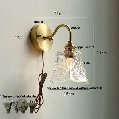 Modern copper wall sconce with antique brass finish and decorbites clear glass etched shade for bedroom lighting