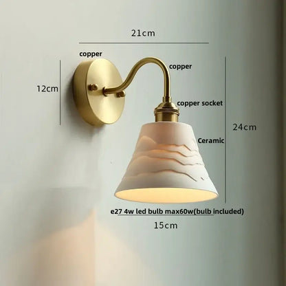 Modern copper wall sconce with clear glass pull chain light featuring a warm-toned ceramic lampshade and polished copper fixture