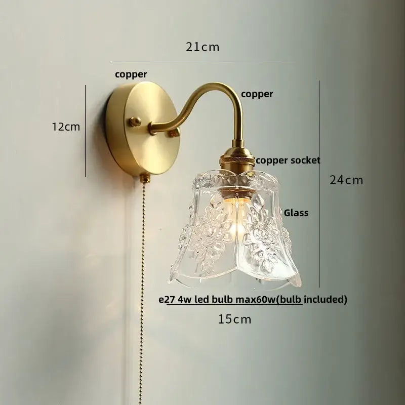 Modern copper wall sconce with antique brass finish and decorbites clear glass etched shade for bedroom lighting