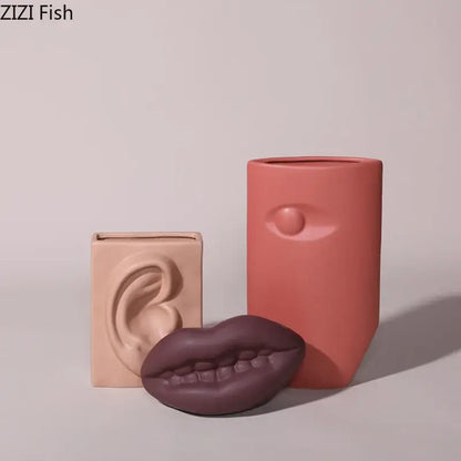 Modern coral ceramic vase by decorbites featuring a matte coral face design with an eye for living room decor