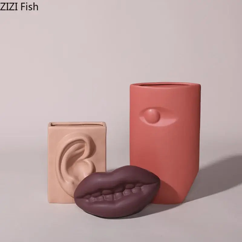 Modern coral ceramic vase by decorbites featuring a matte coral face design with an eye for living room decor