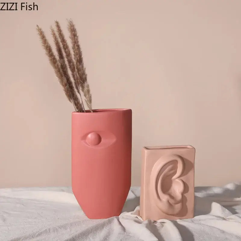 Modern coral ceramic vase decorbites ceramic vase shaped like a face with an embossed eye for living room decor