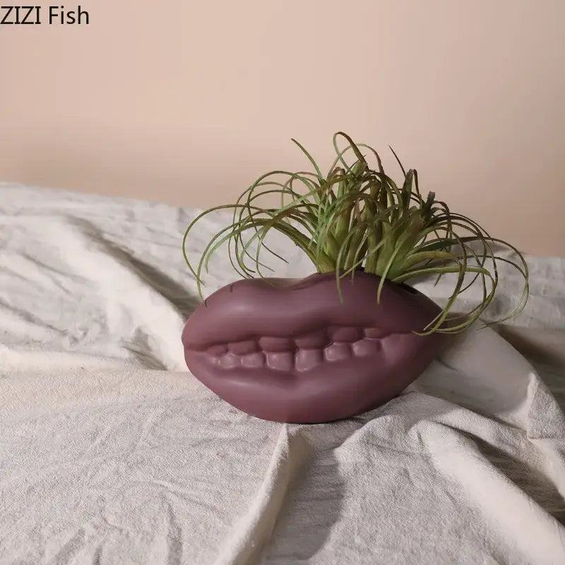 Purple ceramic lips planter with green air plant in decorbites ceramic vase modern coral ceramic vase decorbites ceramic
