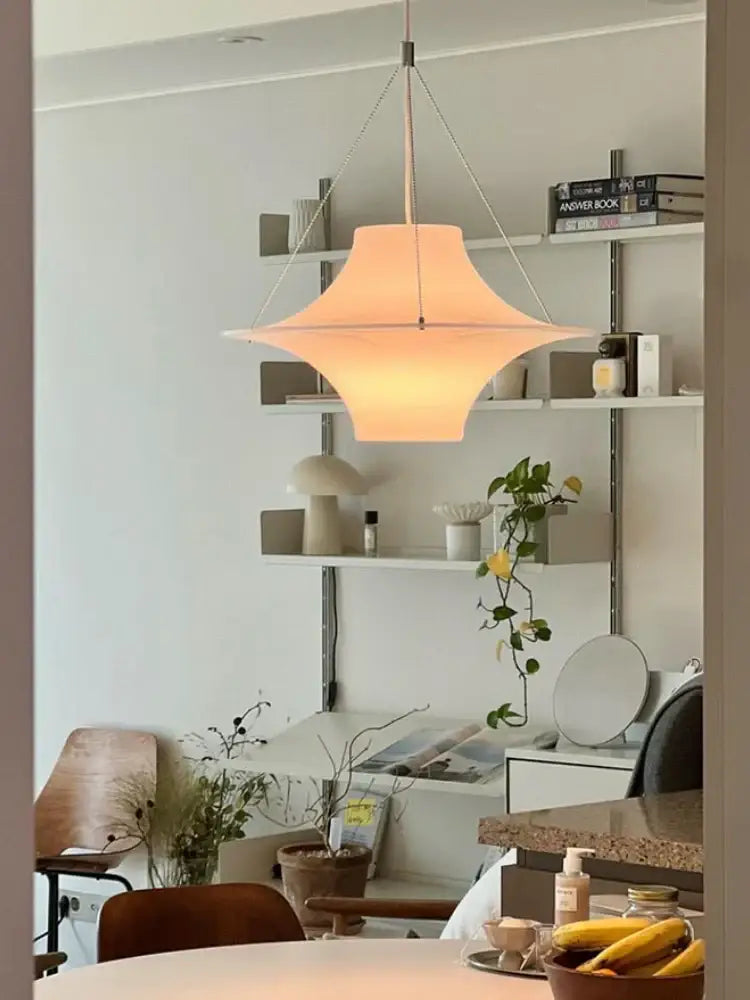 Modern cream acrylic ufo pendant light with warm-toned, softly diffused glow for dining room decorbites cream acrylic