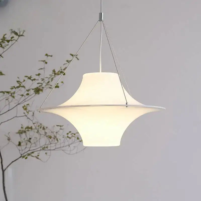 Modern cream acrylic ufo pendant light with wide curved opal glass shade suspended by metallic chains for dining room decorbites