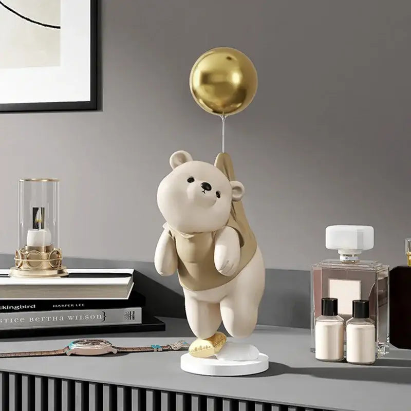 Modern cream and gold balloon polar bear resin figurine holding a golden balloon for office desk decor