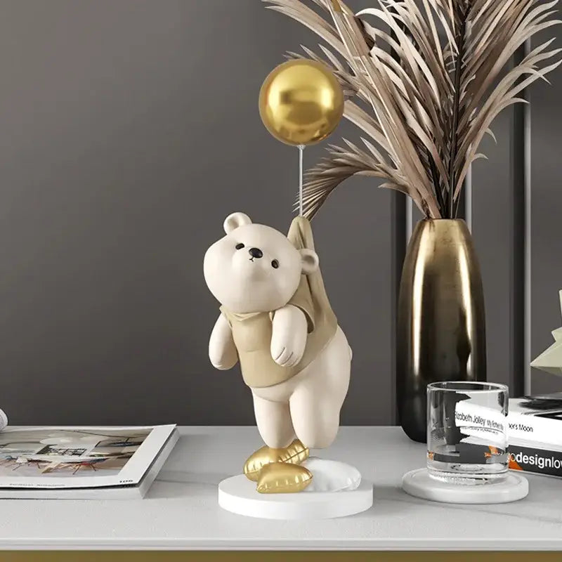 Modern cream and gold balloon polar bear resin figurine holding a metallic balloon for office desk decor