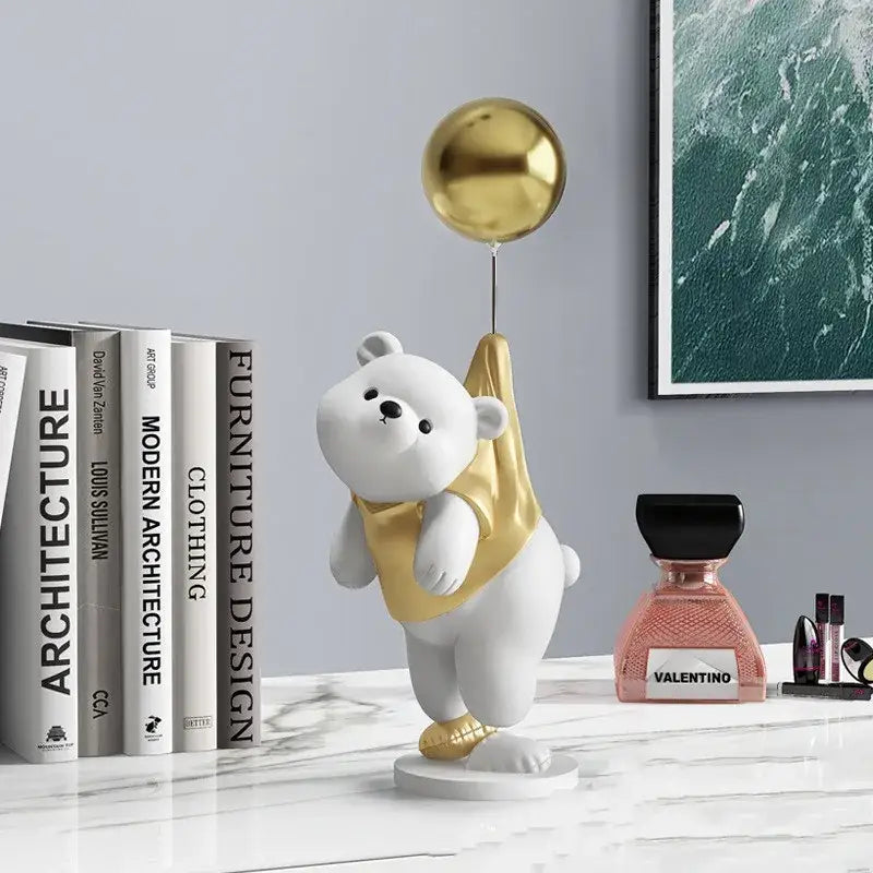 White polar bear resin figurine with gold vest and balloon on circular base for modern office desk decor