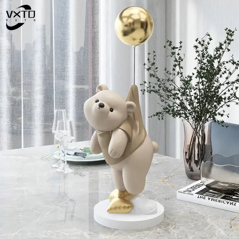 Modern cream and gold balloon polar bear resin figurine with reflective golden balloon on white circular base for office decor