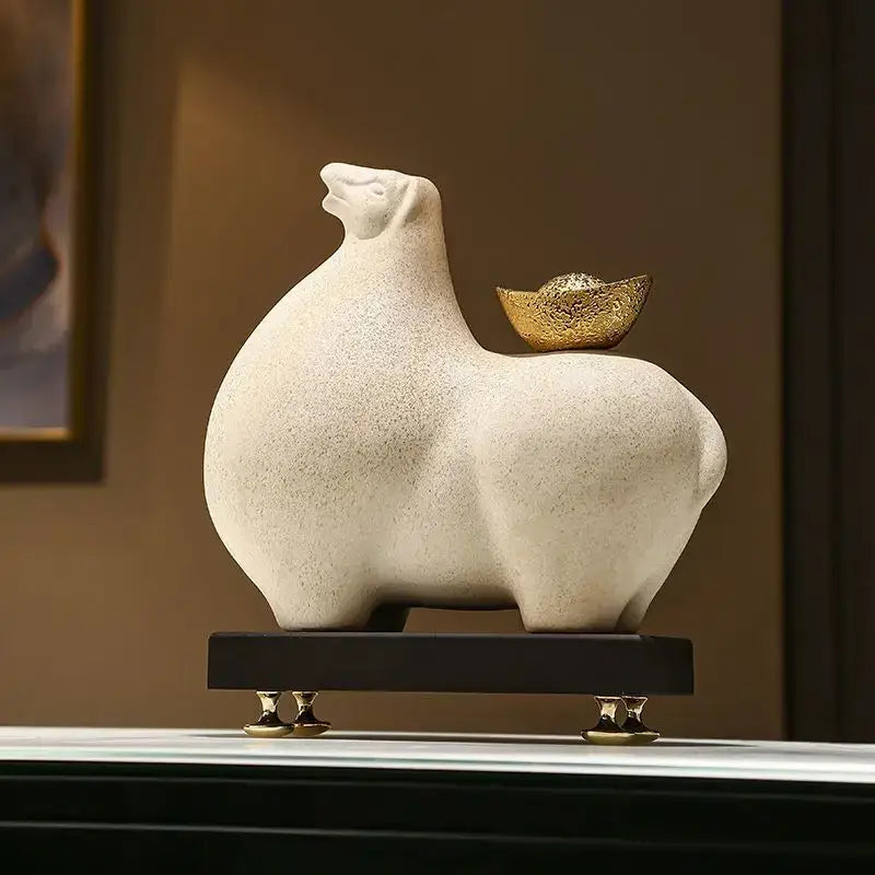 Modern cream and gold horse sculpture figurine with textured ceramic surface and golden ingot decorbites horse sculpture