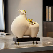 Modern cream and gold ceramic horse sculpture figurine with decorative coins on black base decorbites horse sculpture decor