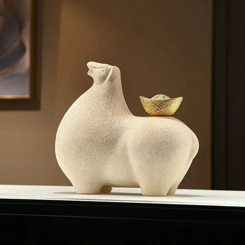 Modern cream and gold ceramic horse sculpture figurine with textured surface and small golden bowl for living room decor