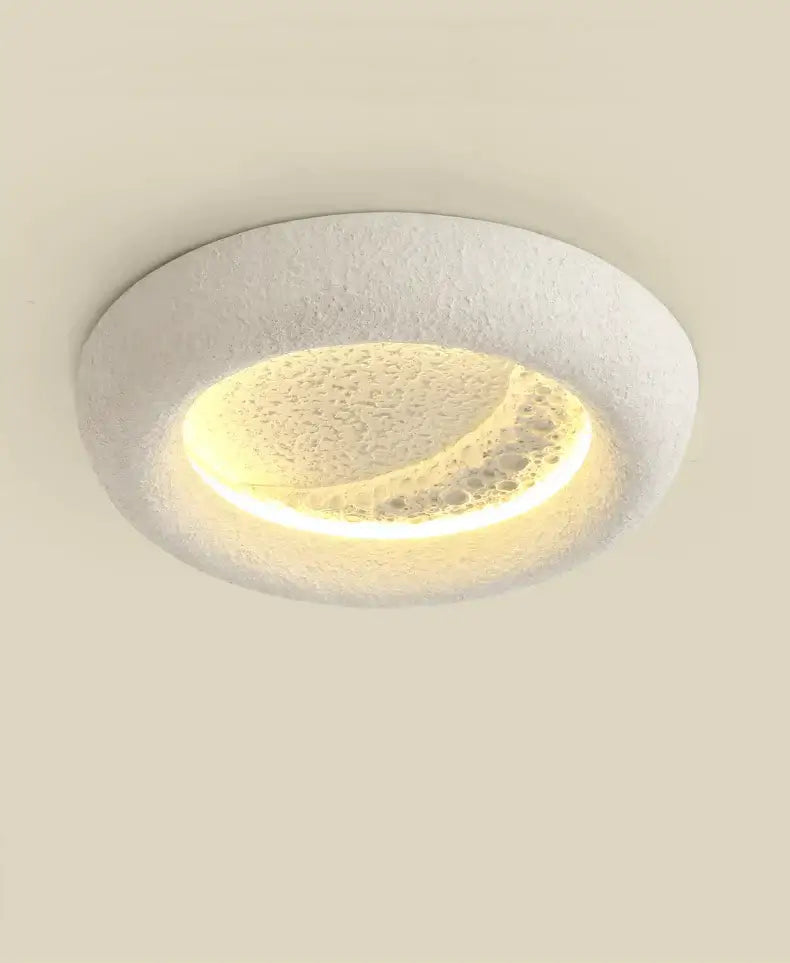 Modern cream breeze moon ceiling lamp with white textured recessed design and warm glowing illumination for bedroom decorbites cream breeze