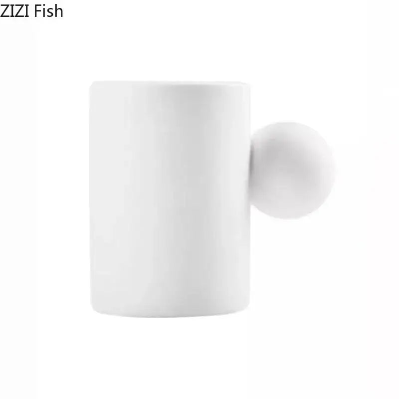 Modern cream ceramic cup with spherical handle and matching saucer set ideal for decorbites cotton candy dining room