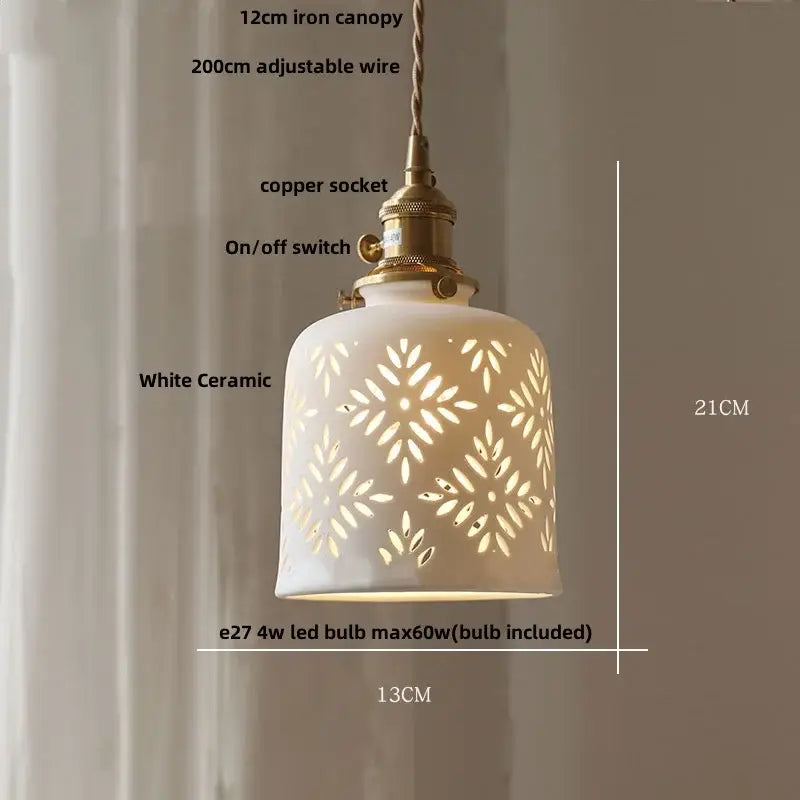 Modern cream ceramic led pendant light with intricate leaf cutouts and brass-finished copper socket by decorbites ceramic led