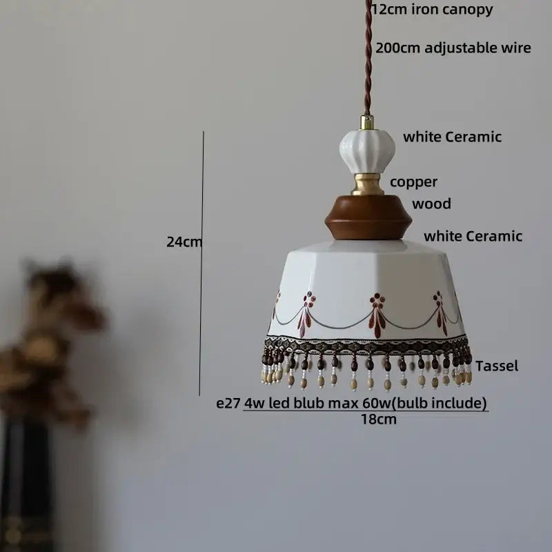 Modern cream ceramic led pendant light with brown decorative accents and beaded tassel by decorbites ceramic led pendant