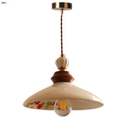 Modern cream ceramic led pendant light with floral pattern inside featuring wooden and brass accents for kitchen decorbites ceramic led pendant