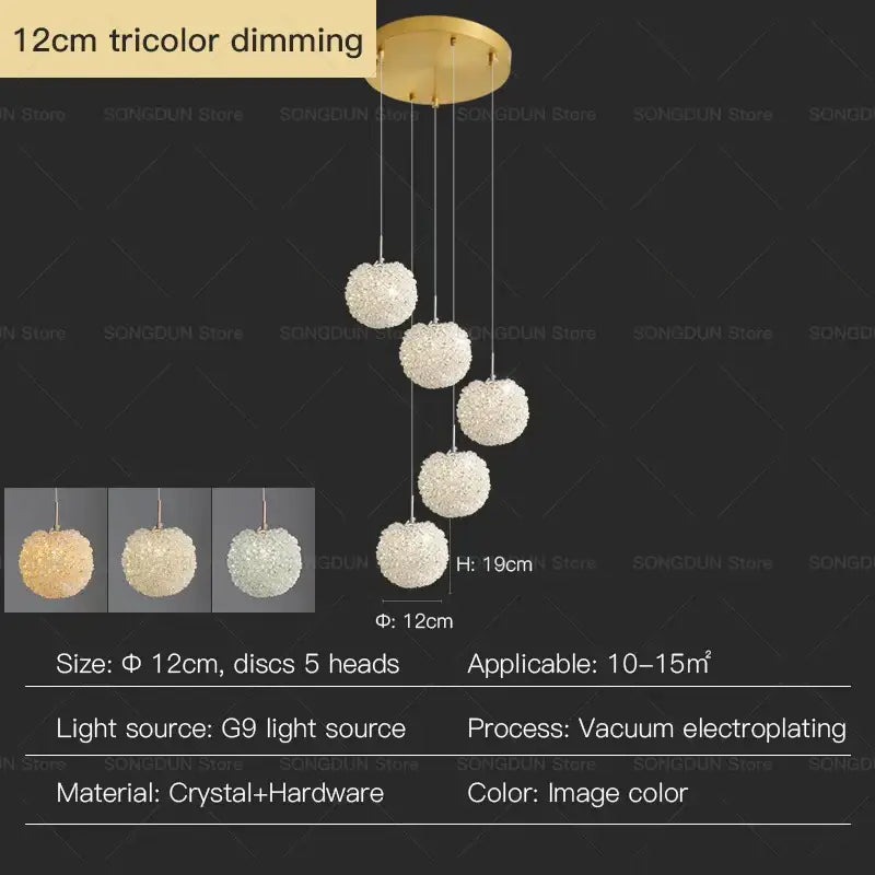 A modern cream crystal round room chandelier pendant light with five crystal spheres and gold-toned base decorbites crystal round