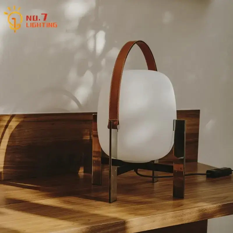 Modern cream designer metal glass table lamp with frosted white glass body brown leather handle for bedroom decorbites designer metal