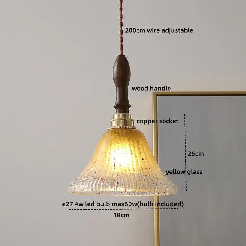 Modern cream glass copper led pendant light featuring yellow textured glass with wooden handle for dining room use