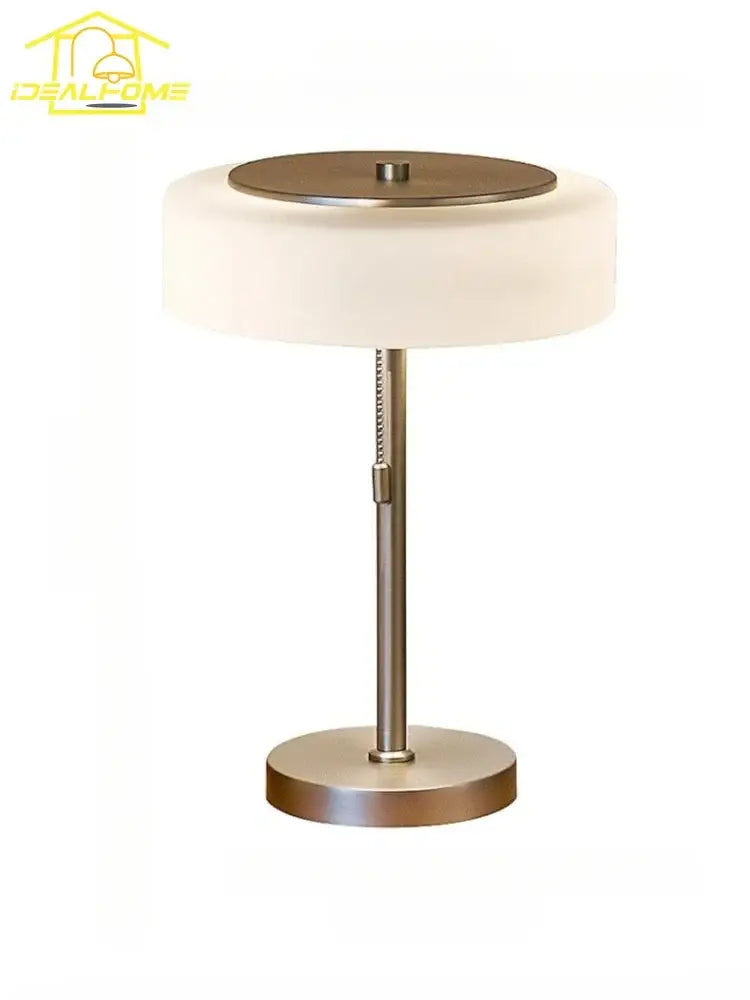 Modern cream glass table lamp with frosted white shade brushed metal base and brass top perfect for bedroom decorbites cream glass