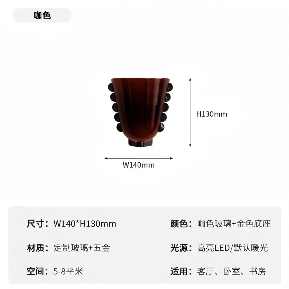 Modern cream glass wall lamp with cafe-colored glass, golden base, and black spherical accents for bedroom decorbites cream glass wall lamp