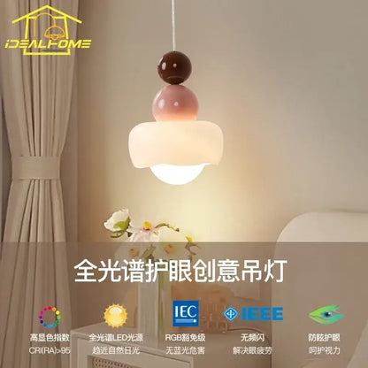 Modern cream and pink stacked resin pendant light with glossy accents and diffuser by decorbites cream for bedroom decor