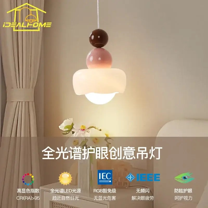Modern cream and pink stacked resin pendant light with glossy accents and diffuser by decorbites cream for bedroom decor