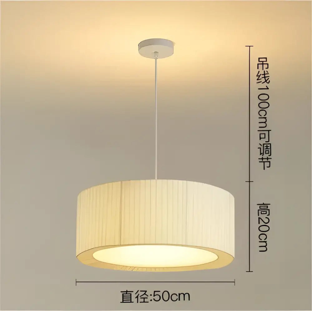 Modern cream pleated designer led fabric pendant light with beige ribbed fabric shade and white metal ceiling fixture by decorbites