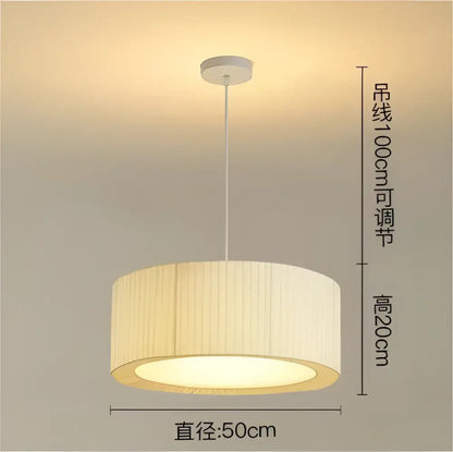 Modern cream pleated designer led fabric pendant light with beige ribbed fabric shade and white metal ceiling fixture by decorbites