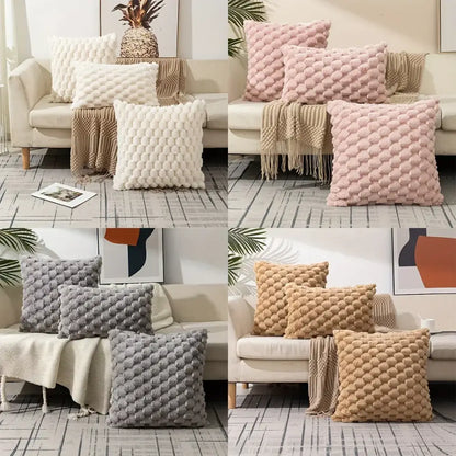Soft cream, blush pink, gray, and beige textured decorative pillow covers with plush pom pom knit design for living room